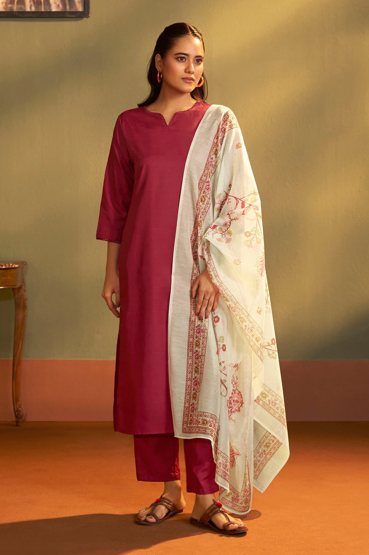 Rust cotton calf-length kurta with matching pants and ivory floral printed dupatta for women