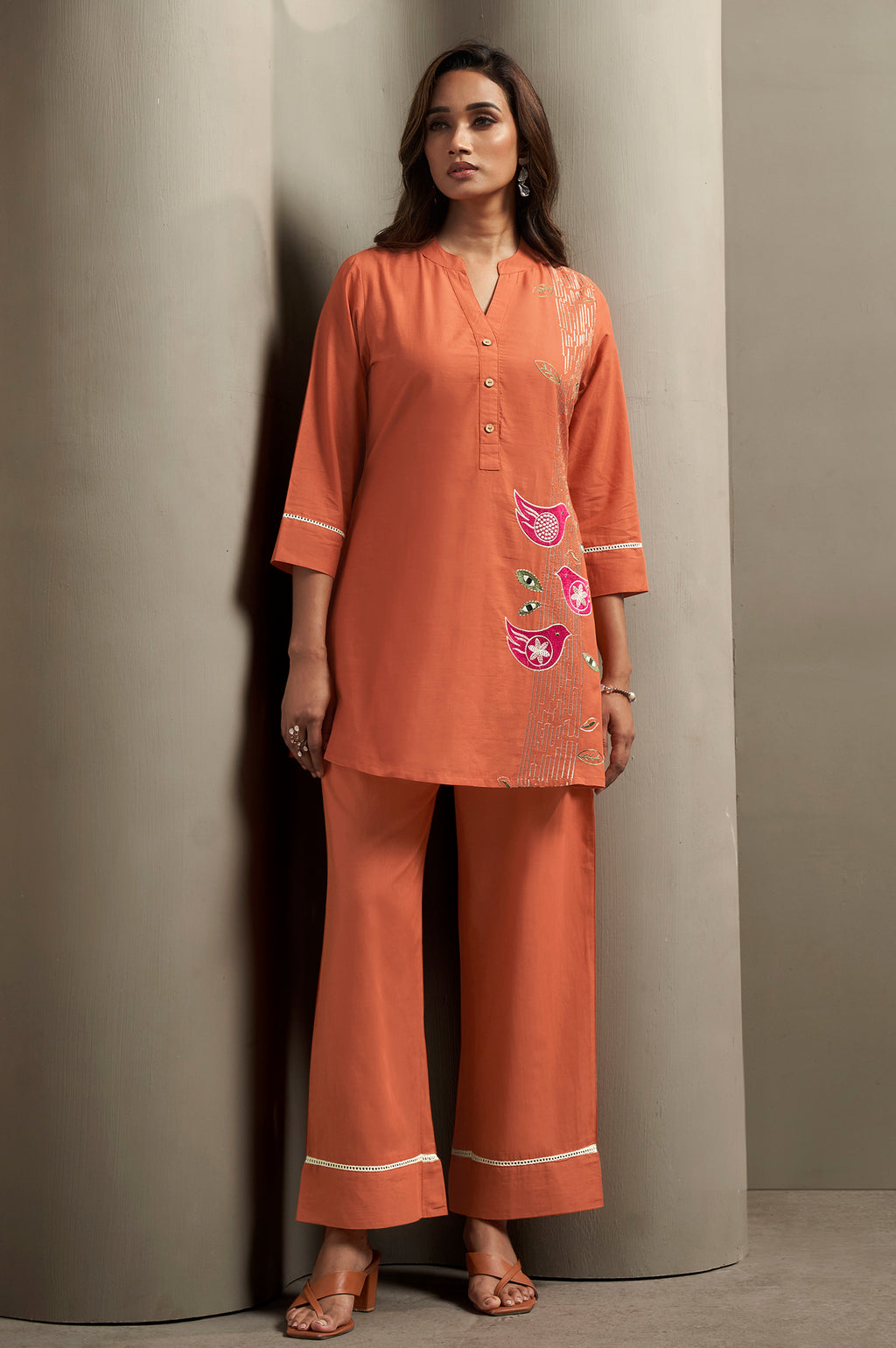 Rust orange pure cotton bird embroidered straight kurta for women