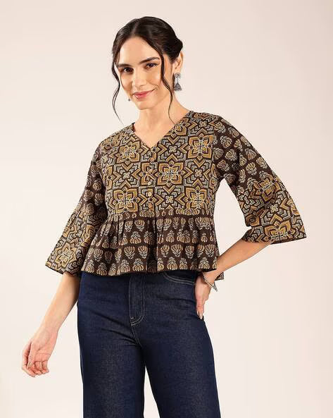 Women’s brown printed cotton peplum top with geometric pattern and flared sleeves