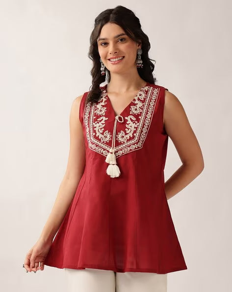 Women’s maroon embroidered cotton A-line tunic top with V-neck and tassel detailing