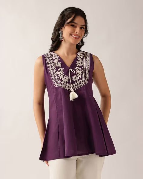 Women’s purple embroidered cotton A-line tunic top with V-neck and tassel detailing