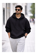 Men's black 430 GSM heavyweight oversized hoodie with a relaxed streetwear fit