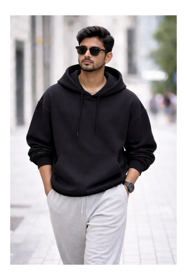 Men's black 430 GSM heavyweight oversized hoodie with a relaxed streetwear fit
