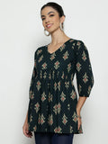 Women wearing dark green printed cotton tunic top with V-neck and 3/4 sleeves
