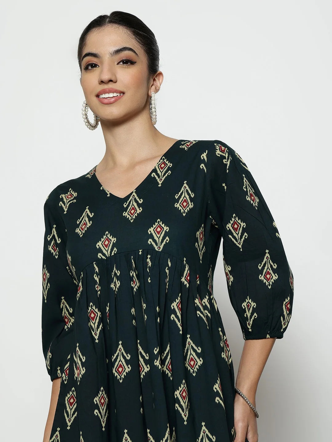 Dark Green Ikat Print Cotton Peplum Top