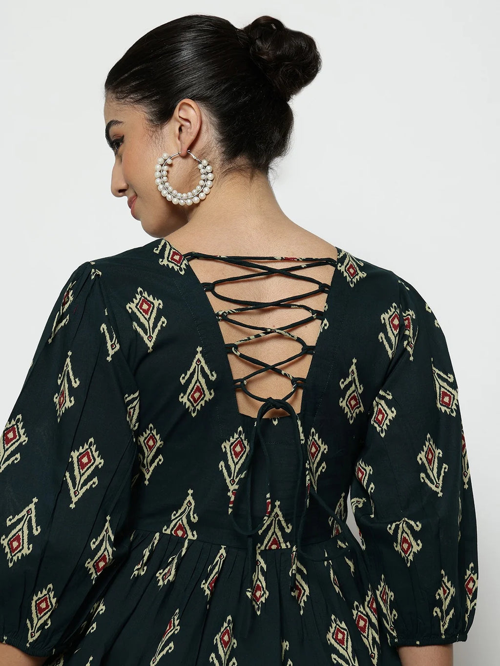 Dark Green Ikat Print Cotton Peplum Top