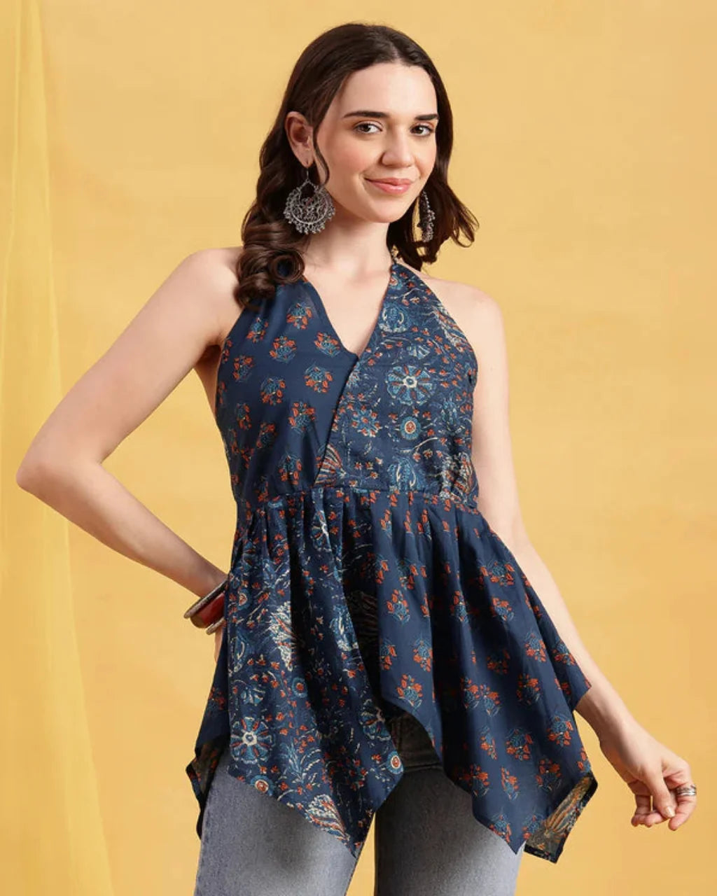 Women wearing blue printed cotton halter top with flared peplum silhouette
