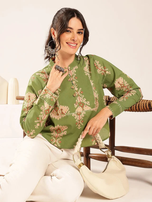 Women wearing premium olive green cotton printed top with ethnic print and full sleeves
