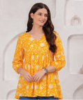 Women's yellow floral printed cotton Alia top with three-quarter sleeves and relaxed fit